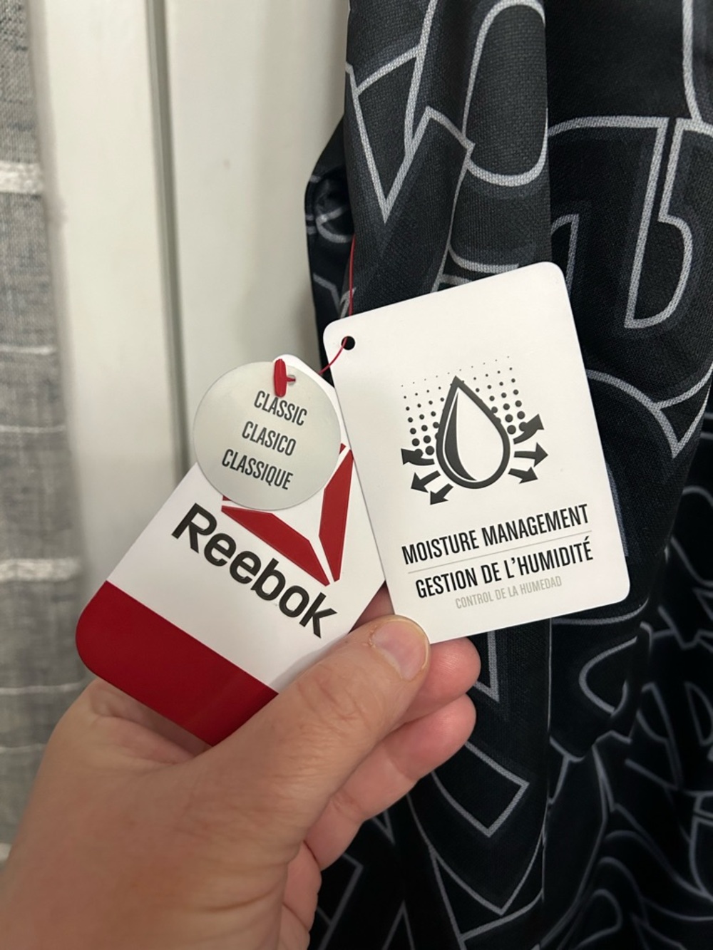 Reebok Black Hoodie with White Logo and Red Tag - Picture 3 of 4